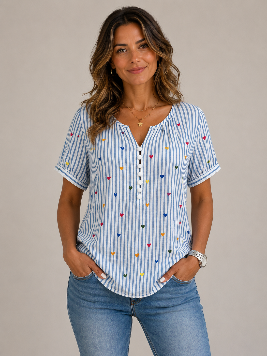 Blusa a rayas con estampado de corazones