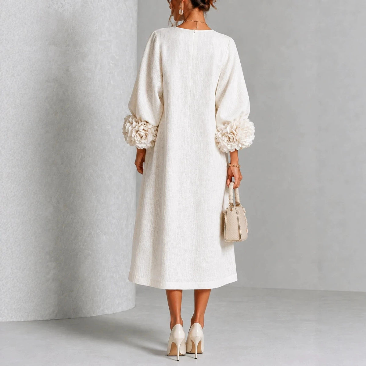 Valeria – Vestido midi con mangas de rosetas