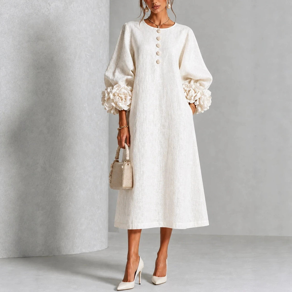 Valeria – Vestido midi con mangas de rosetas
